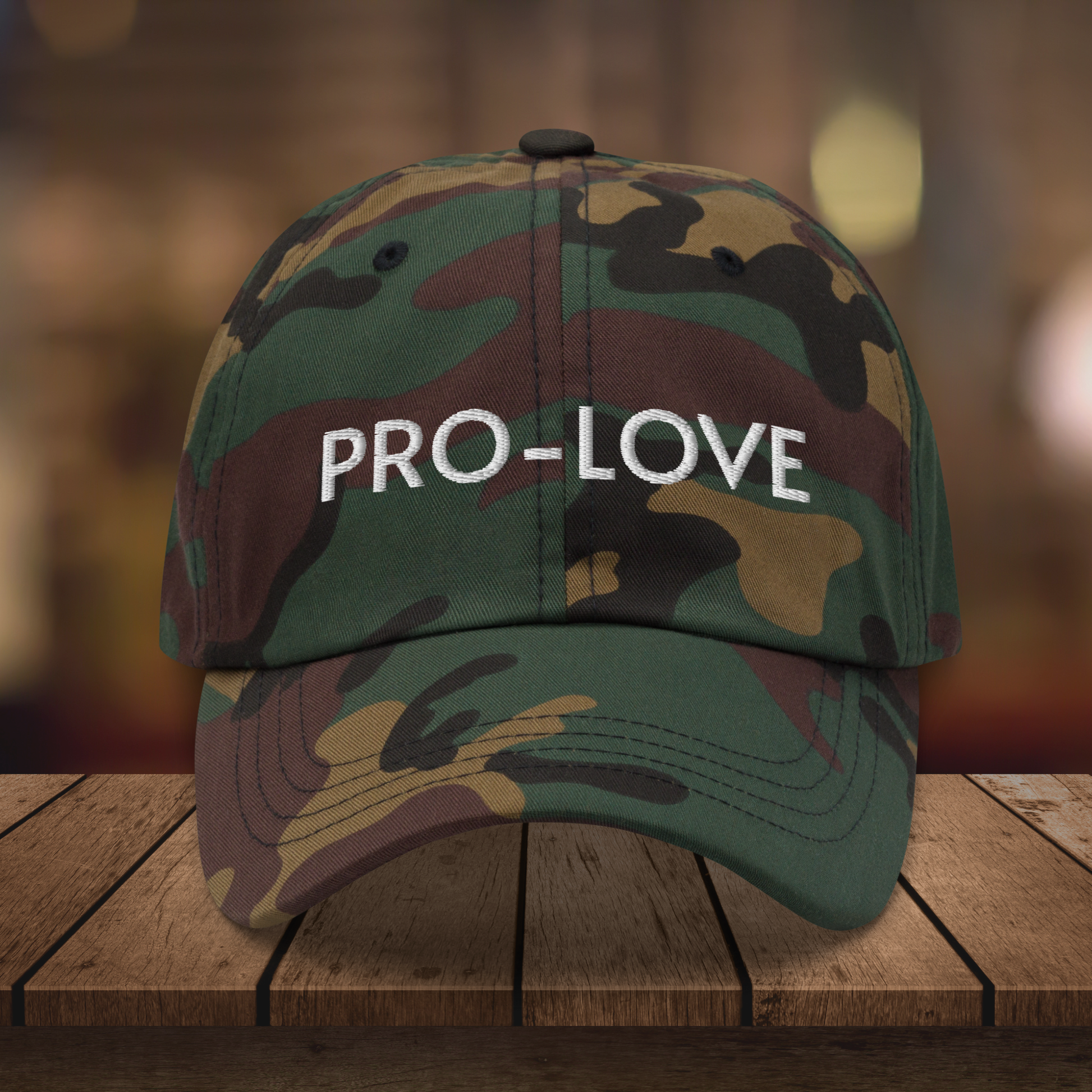 Pro Love| Dad Hat| Feel the Facts A front view of the Pro-Love Dad Hat, featuring the embroidered "Pro-Love" logo on the front and a stylish fit.  camou