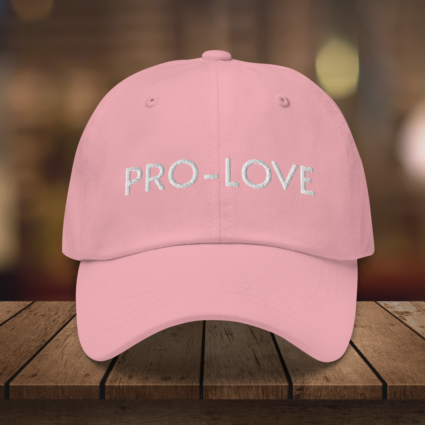 Pro Love| Dad Hat| Feel the Facts A front view of the Pro-Love Dad Hat, featuring the embroidered "Pro-Love" logo on the front and a stylish fit. pink